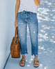Kurze Jeans mit geradem Bein und Rissen