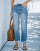 Kurze Jeans mit geradem Bein und Rissen