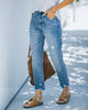 Kurze Jeans mit geradem Bein und Rissen