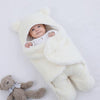 TeddyWrap™ - Der bequemste und sicherste Baby-Pucksack.