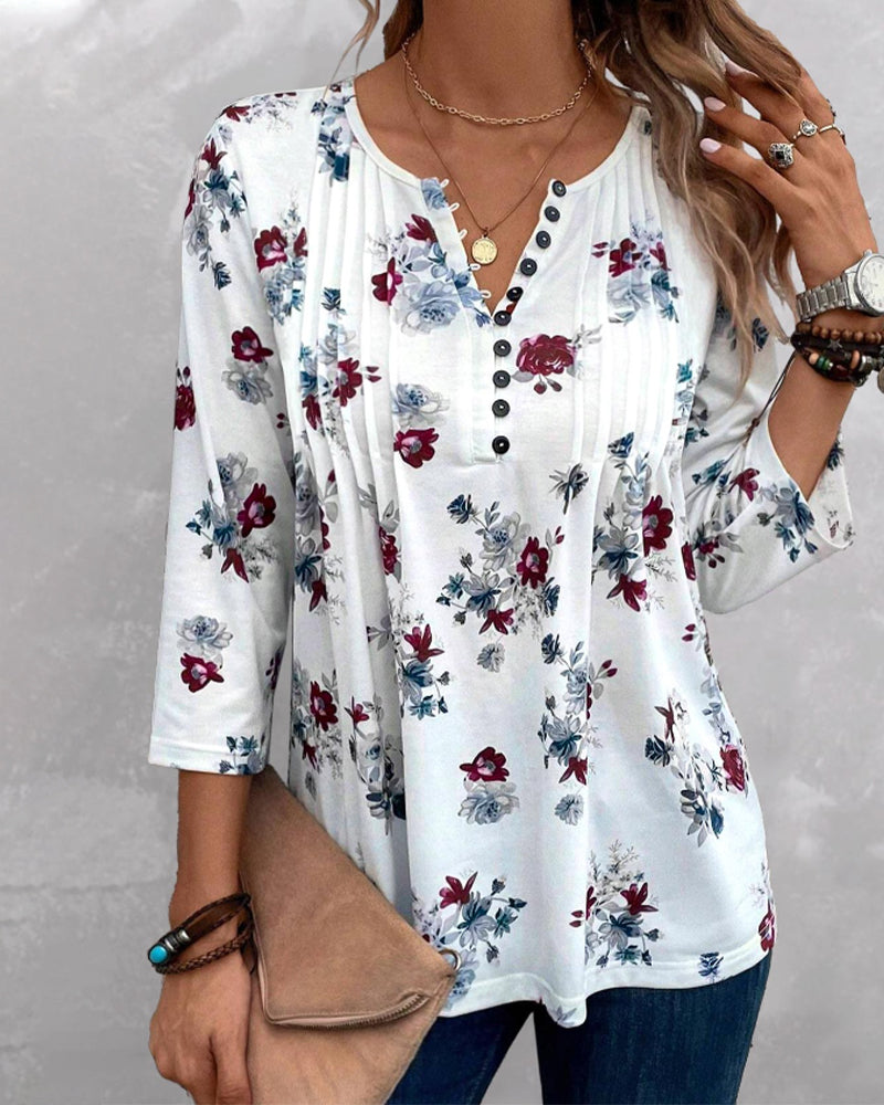 Elegante Bluse mit floralen Druckknöpfen