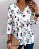 Elegante Bluse mit floralen Druckknöpfen