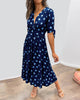 Kleid mit tiefem V-Ausschnitt und Polka Dots