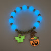 GhostGlow™ – Das leuchtende Halloween-Armband mit Kürbiskopf und Geisterdesign.