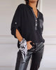 Losse blouse met pailetten