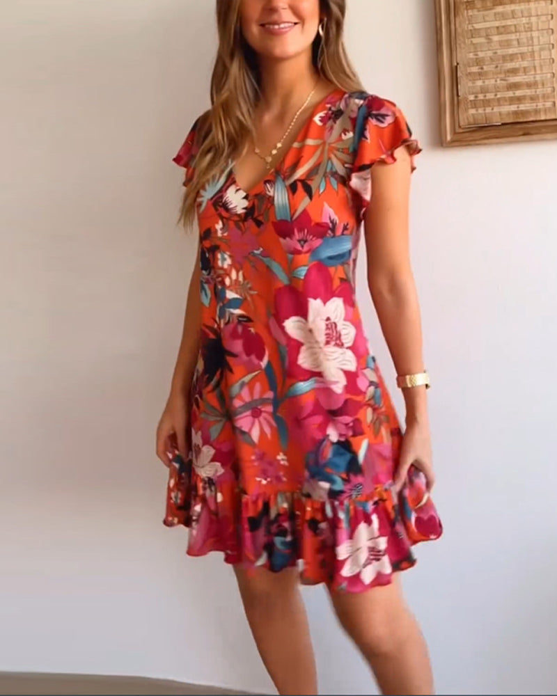 Geblümtes Kleid mit V-Ausschnitt und Rüschen