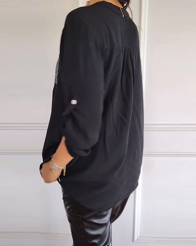 Losse blouse met pailetten