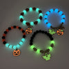 GhostGlow™ – Das leuchtende Halloween-Armband mit Kürbiskopf und Geisterdesign.