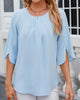 Elegante farbige Bluse mit halben Ärmeln