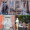SpiderWebDecor™ - Dehnbare Halloween-Spinnweben mit Kunstspinnen für gruselige Dekorationen.