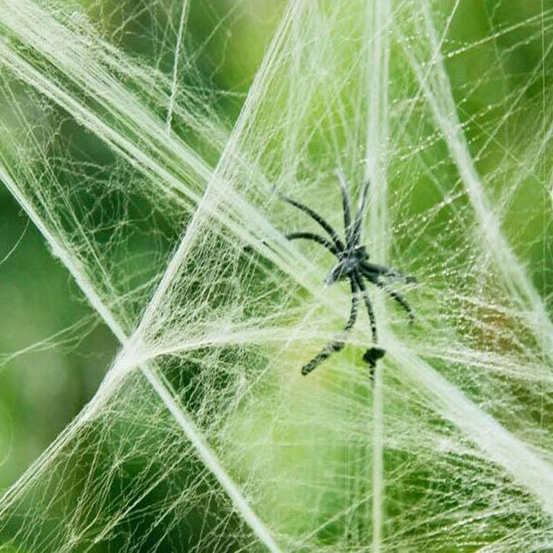 SpiderWebDecor™ - Dehnbare Halloween-Spinnweben mit Kunstspinnen für gruselige Dekorationen.