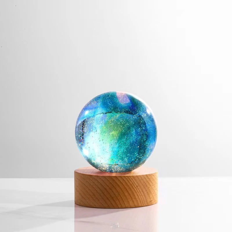 GalaxSphere™ - Die farbenfrohe Glaskugel, die das Universum zu Ihnen nach Hause bringt.