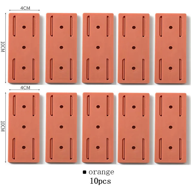 FixPatch™ - Der selbstklebende Wandhalter für Steckdosenleisten.
