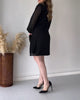 Kleid mit goldener Schnalle
