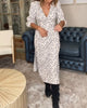 Bedrucktes Kleid mit V-Ausschnitt