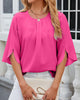 Elegante farbige Bluse mit halben Ärmeln