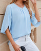 Elegante farbige Bluse mit halben Ärmeln