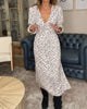 Bedrucktes Kleid mit V-Ausschnitt