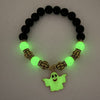 GhostGlow™ – Das leuchtende Halloween-Armband mit Kürbiskopf und Geisterdesign.
